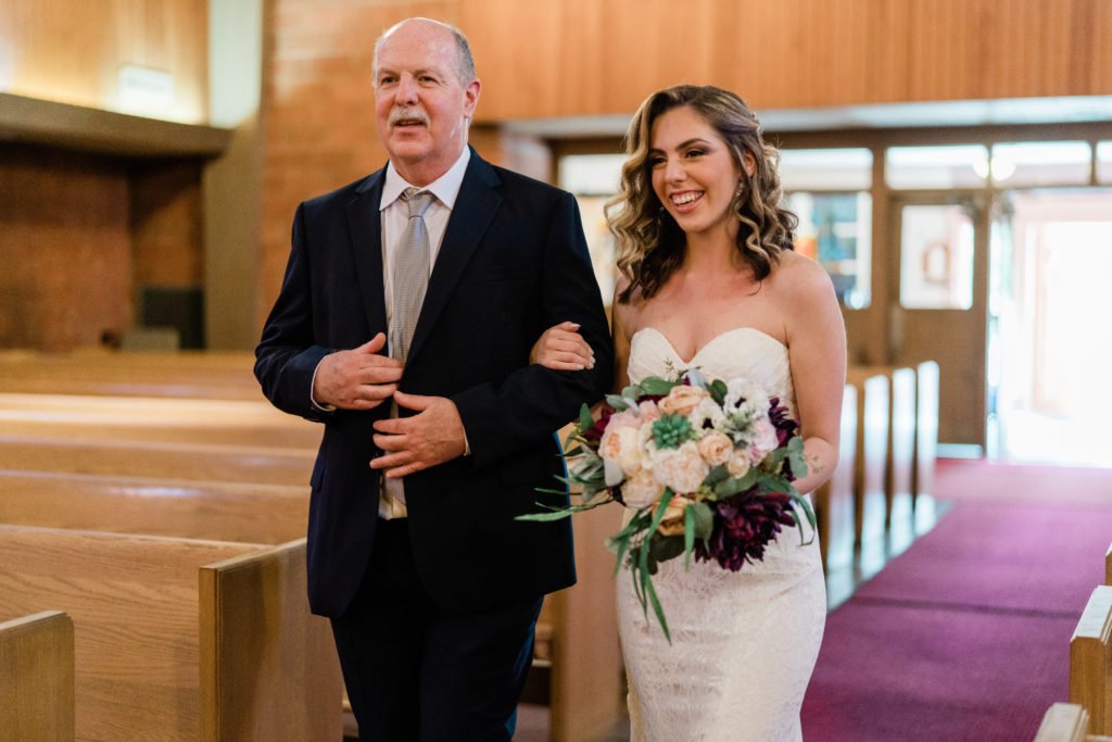 Father walking his daughter down the aisle